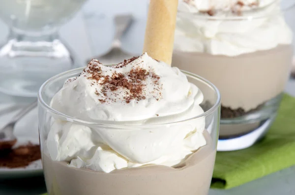 Mocca cream dessert with whipped cream and cocoa powder — Stock Photo, Image