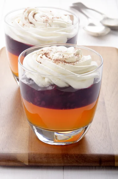 Dessert with orange jelly in a glass — Stock Photo, Image