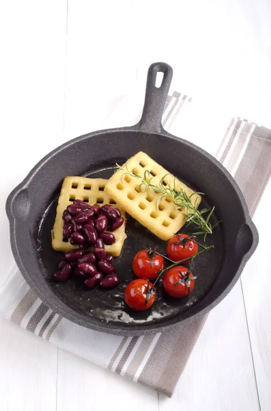 Cast iron pan with potato waffle — Stock Photo, Image