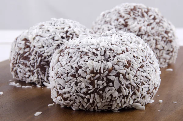 Rum balls with grated coconut — Stock Photo, Image