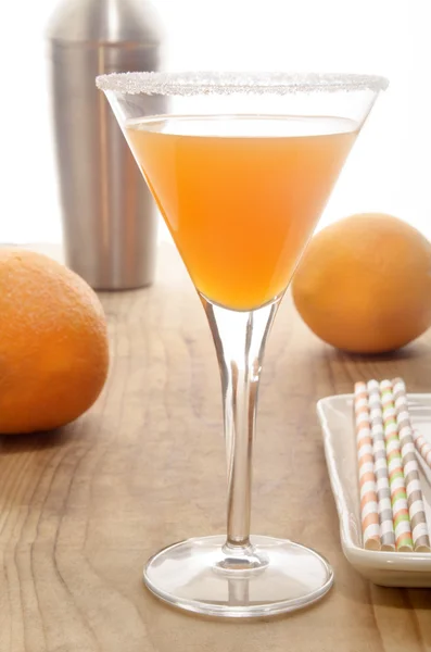 Апельсиновый коктейльный бокал с сахарным ободом — стоковое фото