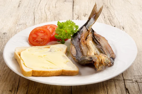 Grilled kipper on a plate — Stock Photo, Image