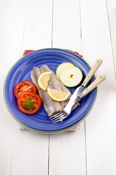 Matjes with lemon, tomato and apple — Stock Photo, Image