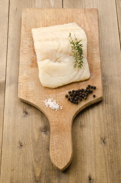 Haddock fillet with thyme, coarse salt and pepper — Stock Photo, Image