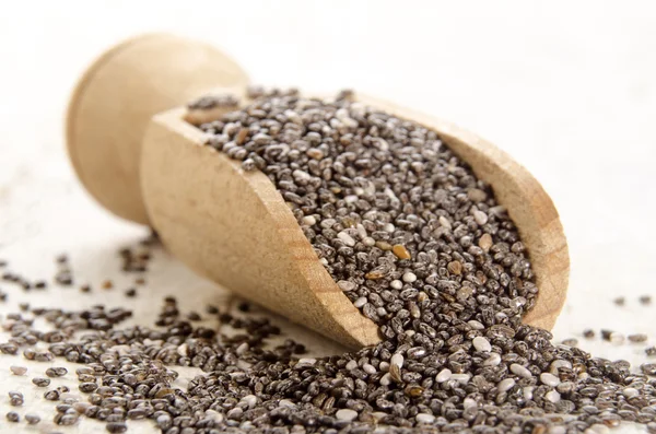 Chia seed on a wooden shovel — Stock Photo, Image