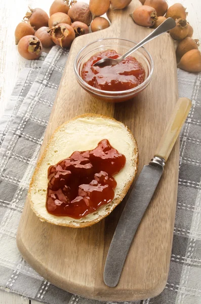 Bread with home made rose hip jelly — Stock Photo, Image