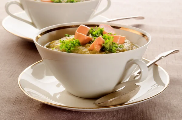 Potato soup with sliced vienna sausages and parsley — Stock Photo, Image