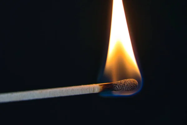 match is burning hot on black