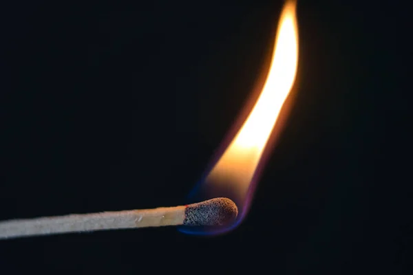 Match is burning hot on black — Stock Photo, Image