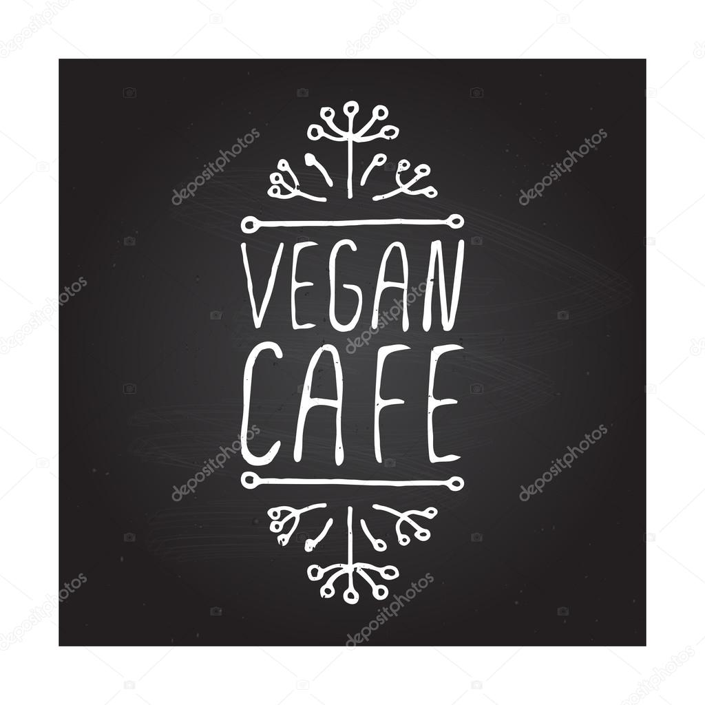 Vegan cafe hand-sketched typographic element on chalkboard background. Restaurant label. Suitable for ads, signboards, menu and web banner designs
