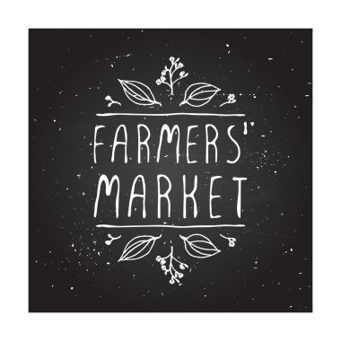 Kara tahta arka plan üzerindeki tipografik öğelerin el çizdi