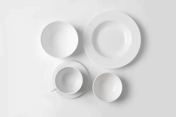 Clean dishware on white — Stock Photo, Image