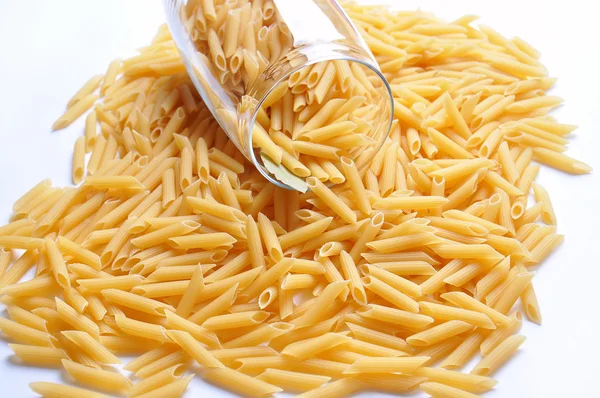 Close up of yellow raw italian pasta — Stock Photo, Image