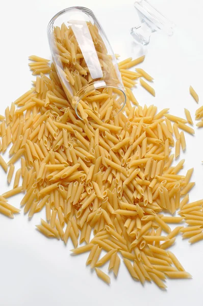 Close up of yellow raw italian pasta — Stock Photo, Image