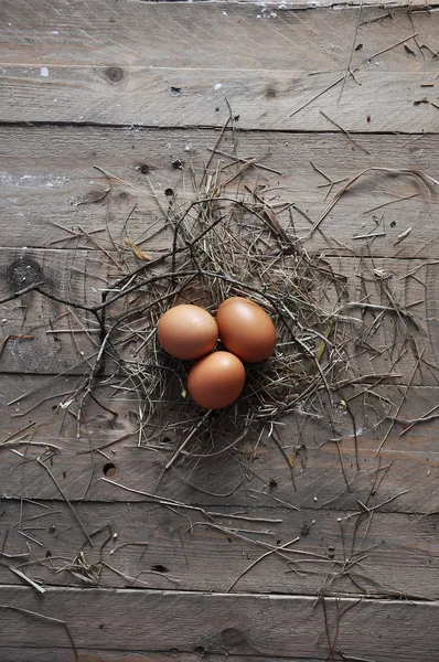 Eggs on a wooden background — Stock Photo, Image