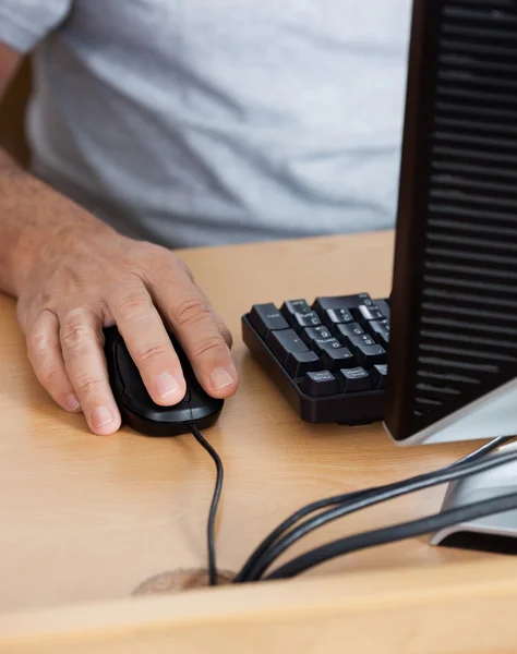 Midsection Of Senior Man Using Computer In Classroom — Stock Photo, Image