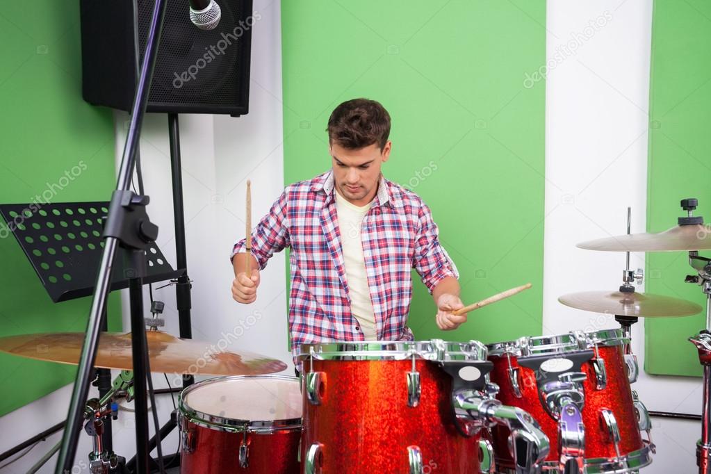 Professional Playing Drums In Recording Studio