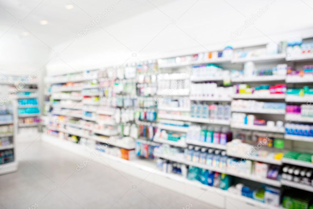 Products Arranged In Shelves At Pharmacy