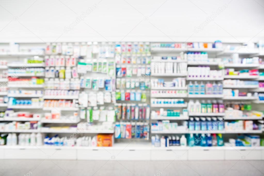 Medicines Arranged In Shelves At Pharmacy