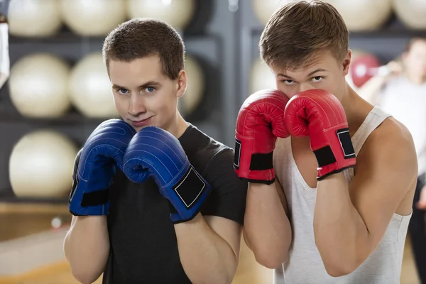 Confident Young Men Boxing In Gym — Stock Photo, Image