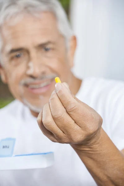 Male Patient Showing Pill In Rehab Center Stock Image