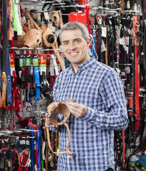 Happy Customer Holding Dog Muzzle At Pet Store — Stock Photo, Image