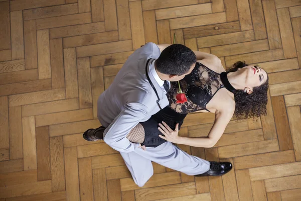 Sensuous Woman Performing Tango with Partner — стоковое фото