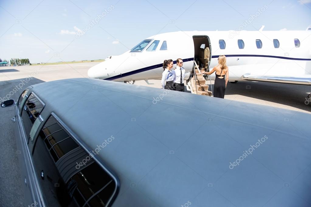 Woman Boarding Private Jet