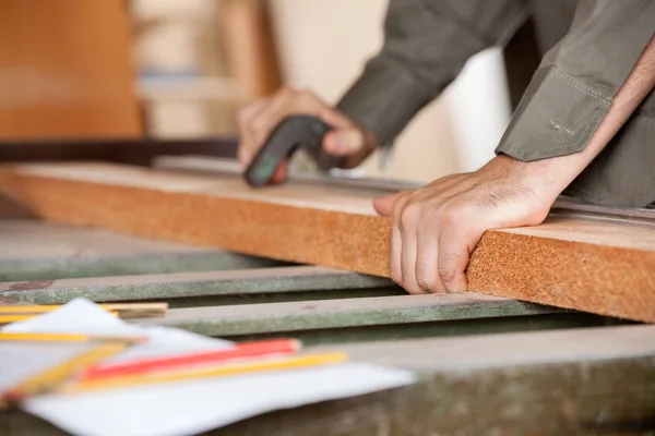 Cropped Image Of Carpenter Cutting Wood With Tablesaw — Stock Photo, Image