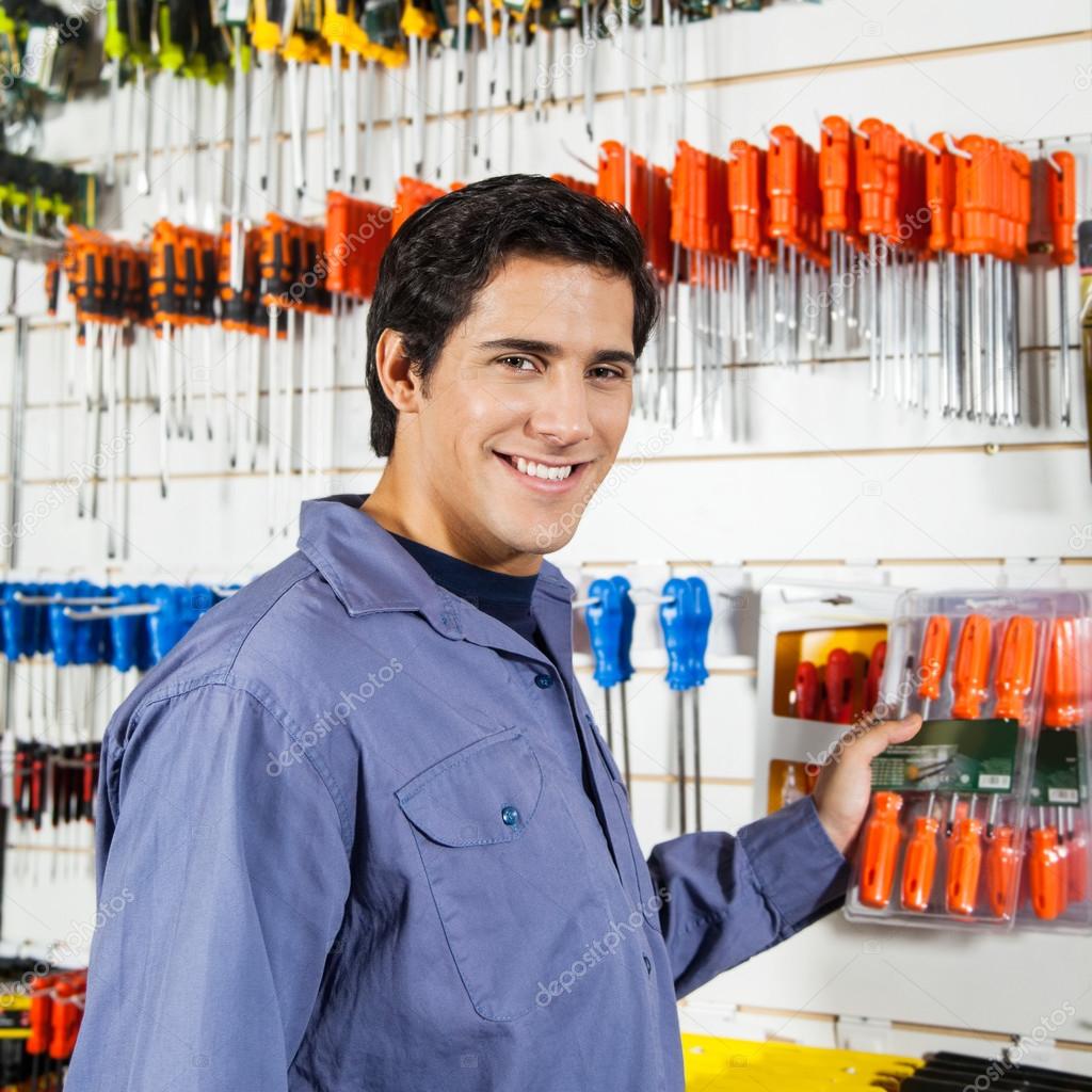 Customer Selecting Screwdrivers In Hardware Shop