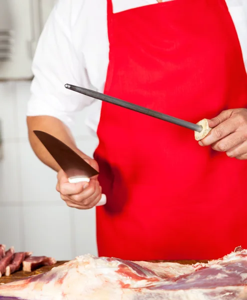 Midsection Of Butcher Sharpening Knife — Stock Photo, Image