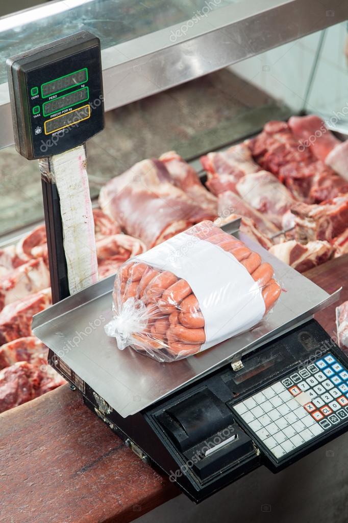 Packed Of Sausages On Weight Scale Stock Photo by ©SimpleFoto 58449845