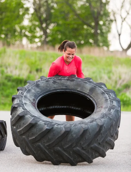 Athlete Flipping Truck Tire Outdoors — Stock Photo, Image