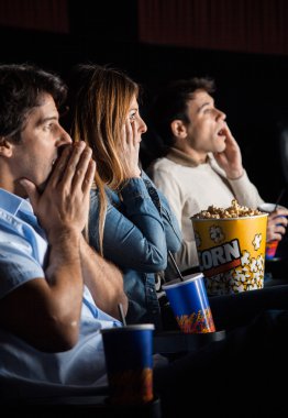Shocked People Watching Movie clipart