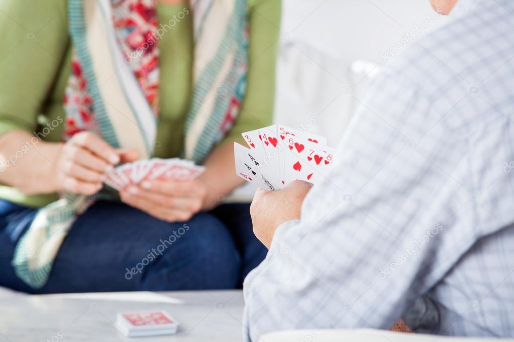 Senior Couple Playing Cards