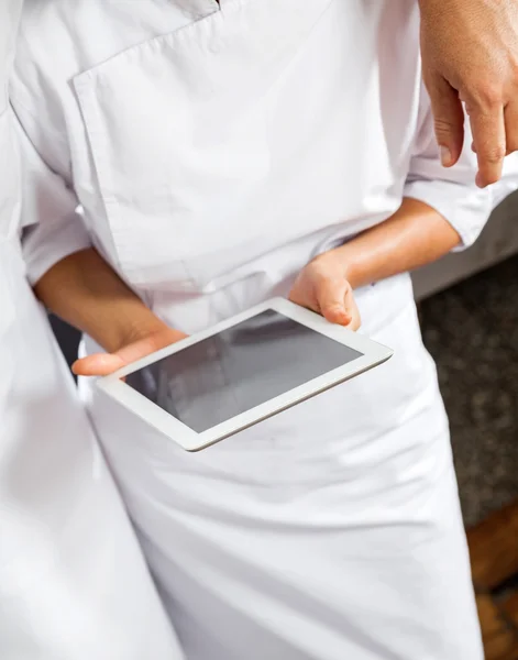 Midsection Of Butchers Using Digital Tablet — Stock Photo, Image