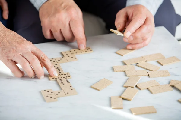 Gente jugando domino fotos de stock, imágenes de Gente jugando domino sin royalties | Depositphotos Gente jugando domino fotos de stock, imágenes de Gente jugando domino sin royalties | Depositphotos