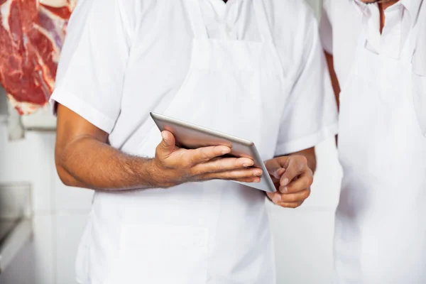 Midsection Of Butchers Using Digital Tablet — Stock Photo, Image