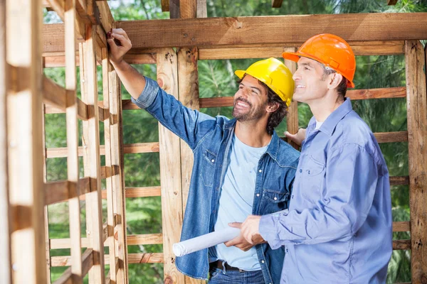 Happy Architects Discussing At Construction Site — Stock Photo, Image