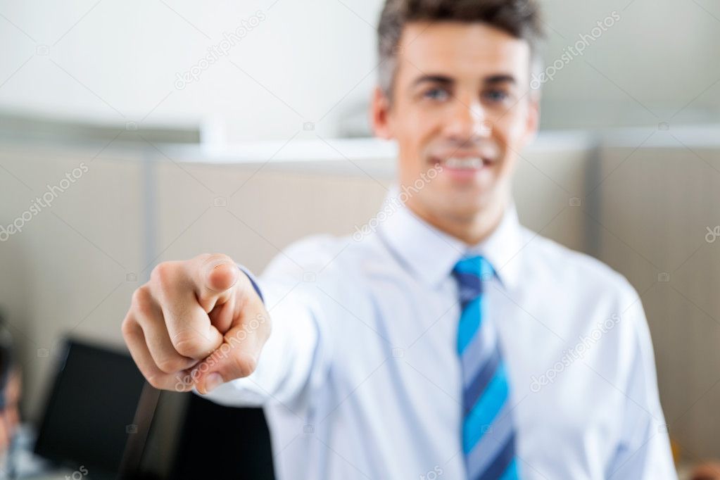 Confident Manager Pointing In Call Center