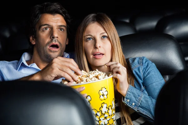 Shocked Couple Watching Movie In Theater — Stock Photo, Image