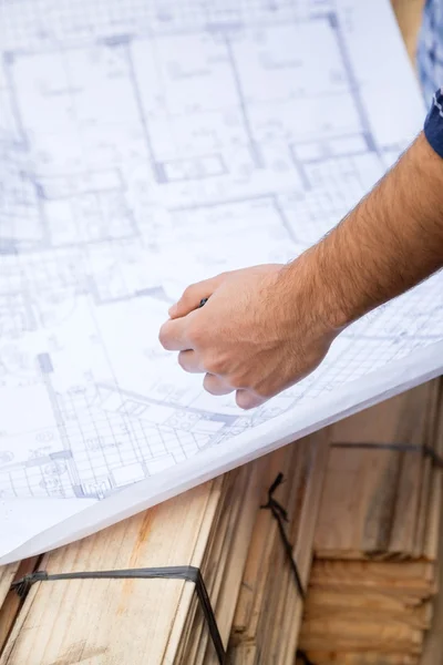Carpenter With Blueprint At Site — Stock Photo, Image