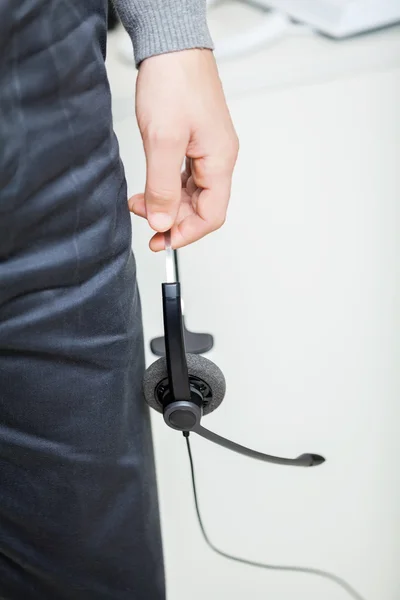 Biuro obsługi klienta gospodarstwa słuchawki — Zdjęcie stockowe