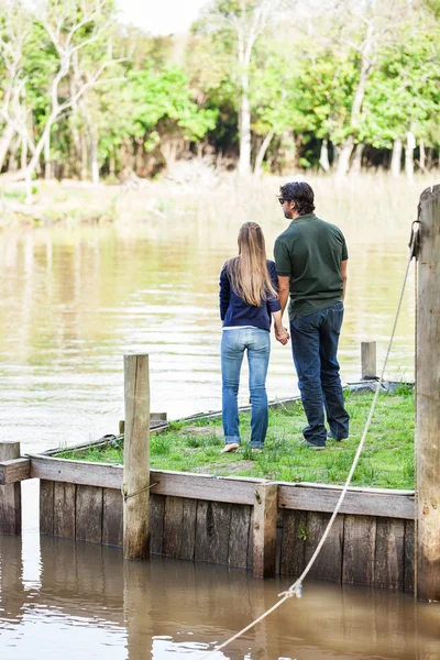 Couple Holding Hands On Pier — Stock Photo, Image