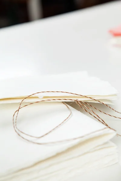 Thread And Notepad Papers On Table — Stock Photo, Image