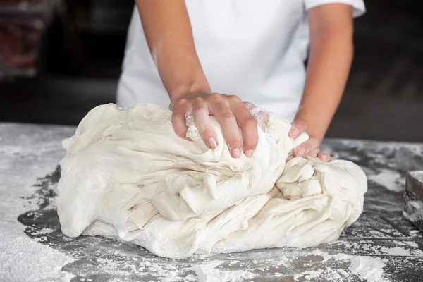 Bakers Hands Kneading Dough In Bakery — Stock Photo, Image