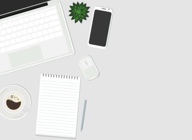 Vektör çizimi. Masaüstünde bir dizüstü bilgisayar, bir cep telefonu, bir bitki, bir fincan kahve ve bir kağıt defter var. Yukarıdan görüntüle