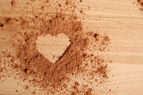 Heart shape made of cocoa — Stock Photo, Image