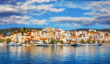 Panoramic view of Skiathos Town at sunrise clipart