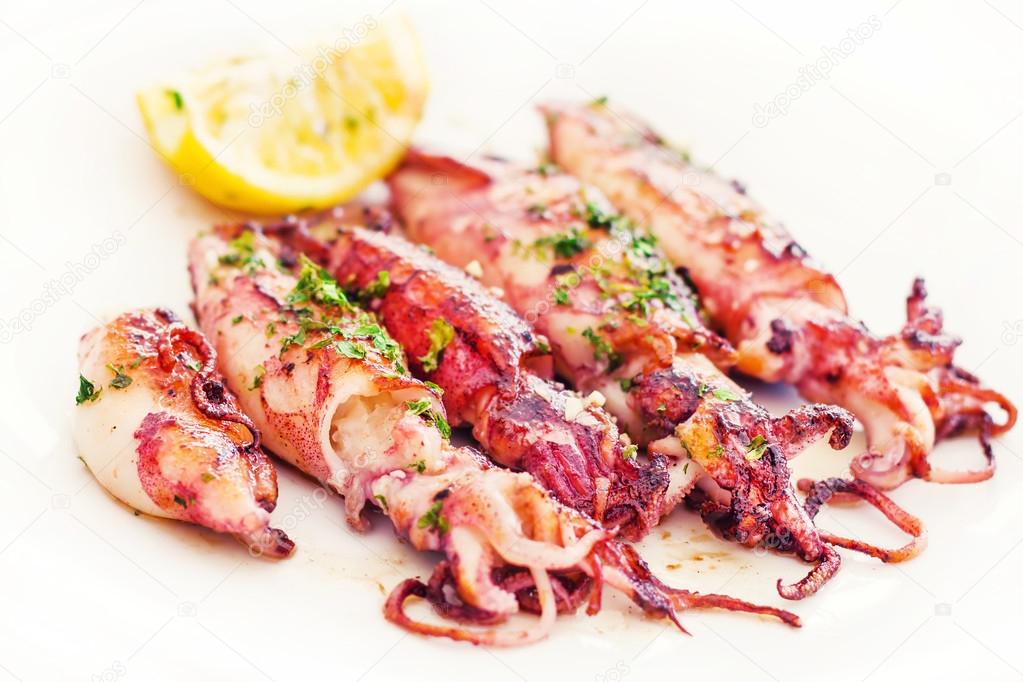 Fresh Adriatic squid in buzara sauce (shallow dof)